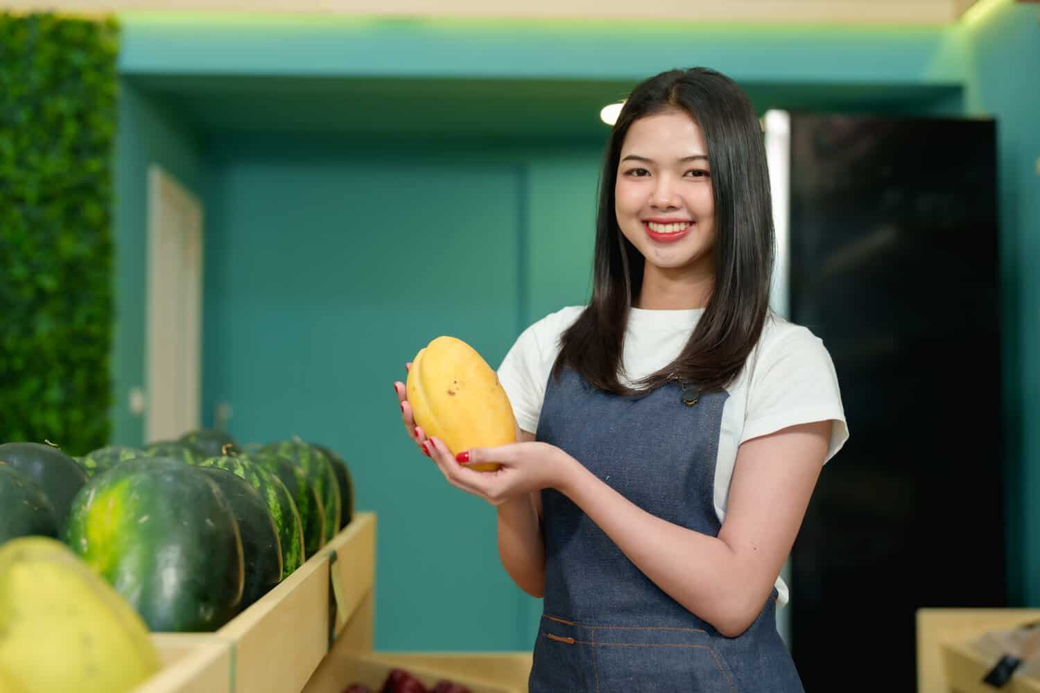 Confident fruit business owner partnering with a certified Thai fruits exporter 